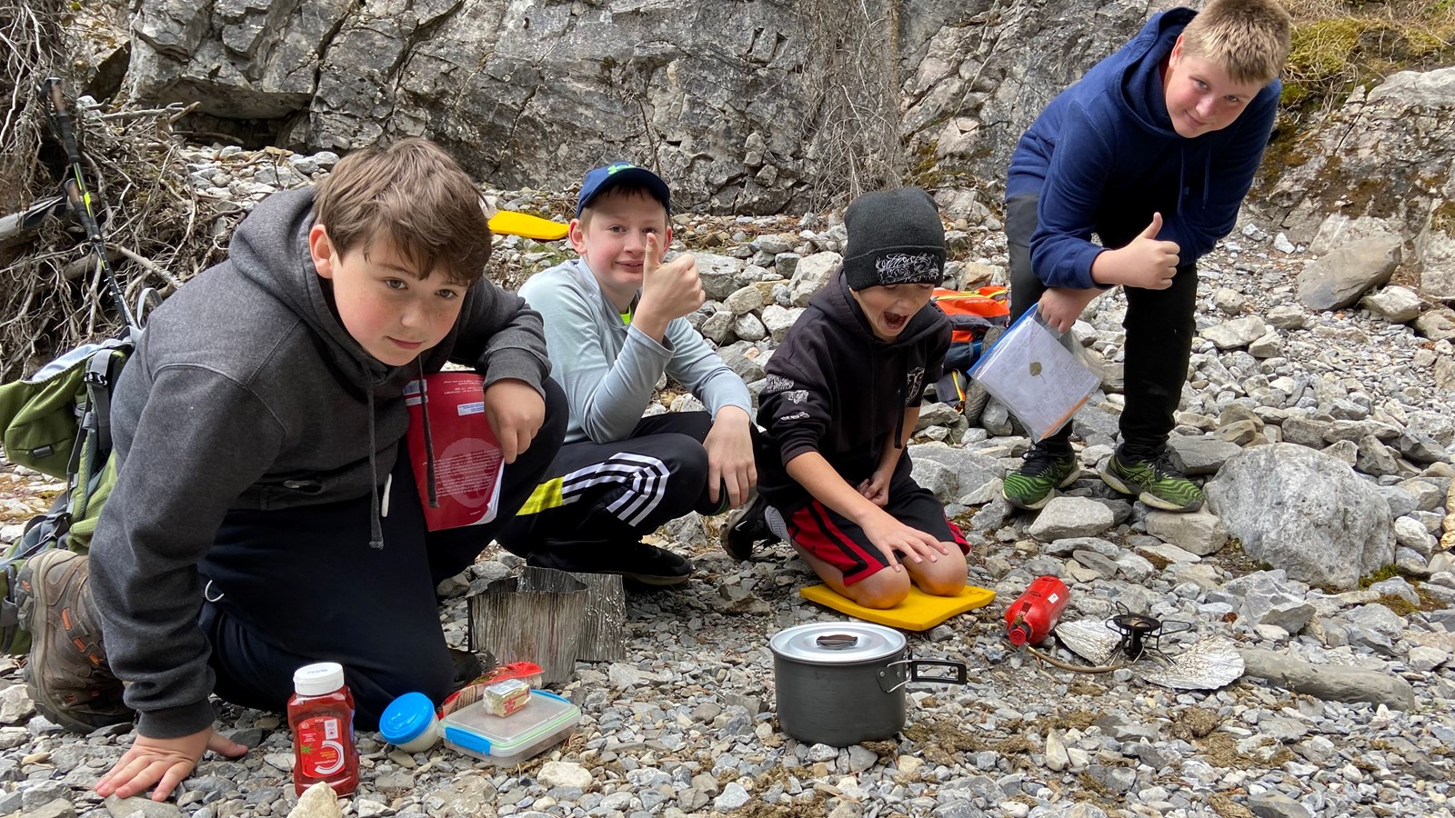 Students cooking outdoors